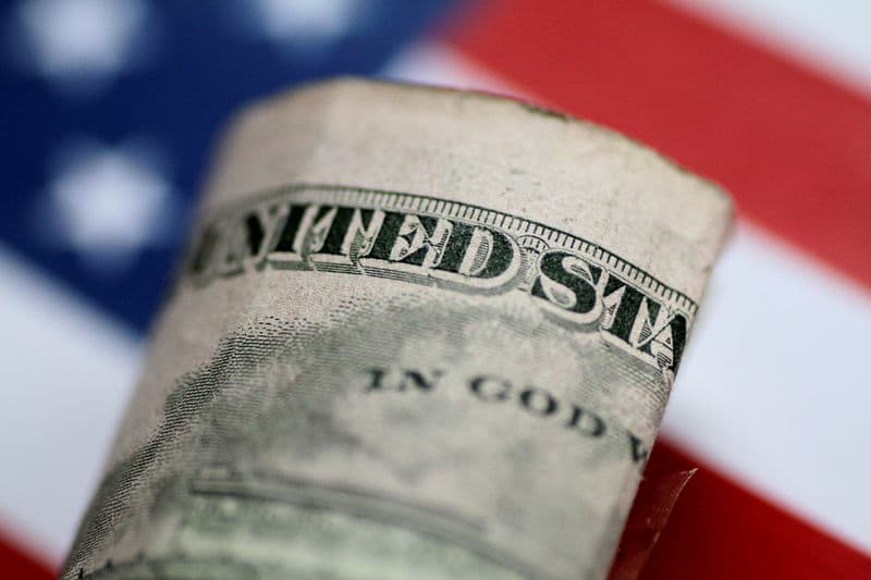 Dollar gains on trade optimism ahead of Fed decision