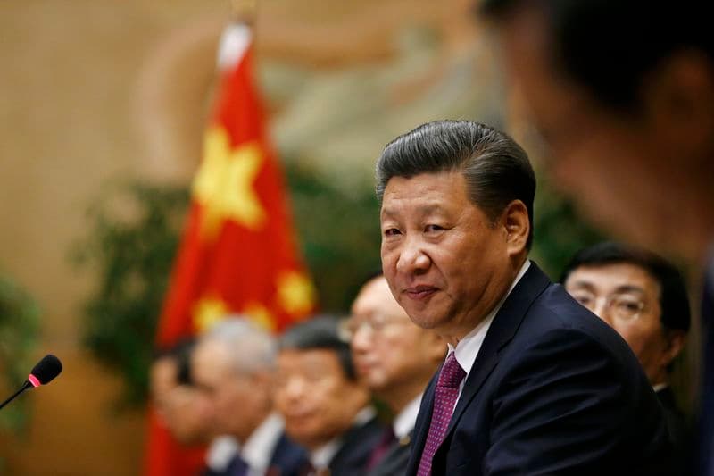 Xi calls for open trade after talks with Trump