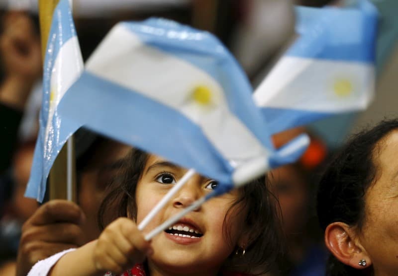 Argentina's Treasury is selling dollars to curb the peso's decline.
