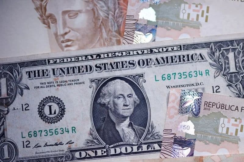Asian currencies flat, dollar stable near one-month high
