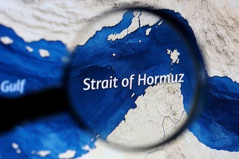 What are the risks of closing the Strait of Hormuz?